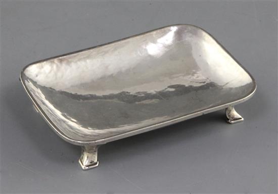 A 1930s Omar Ramsden small silver rounded rectangular dish, 64 grams.